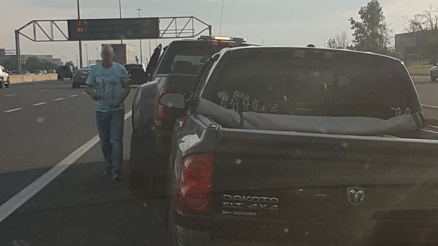 Tow Truck driver on side of 401